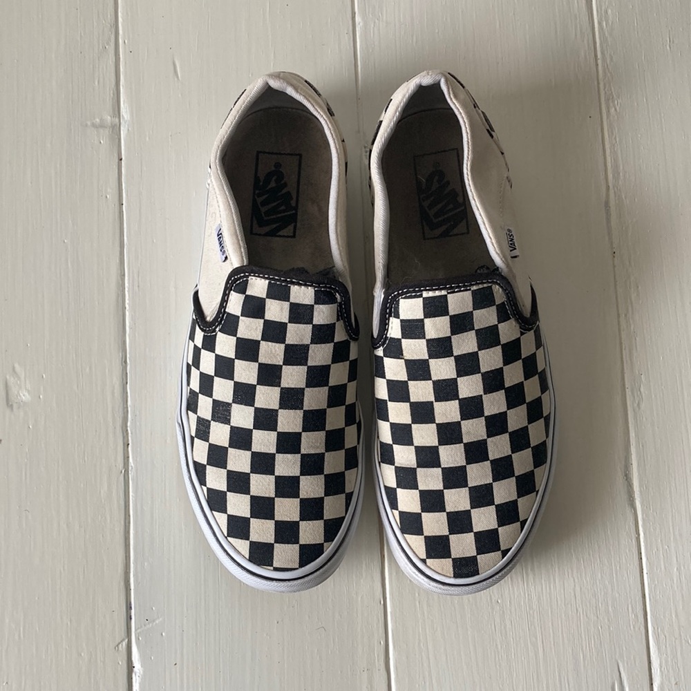 Vans black and white checkered slide on.
